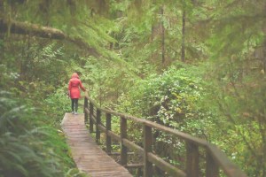 person alone on nature walk representing depression can present in many ways